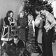 Illustration for article titled 70 Years of First Ladies Standing in Front of Christmas Trees